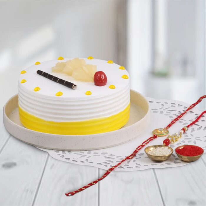 Kundan Couple Rakhi With Pineapple Cake